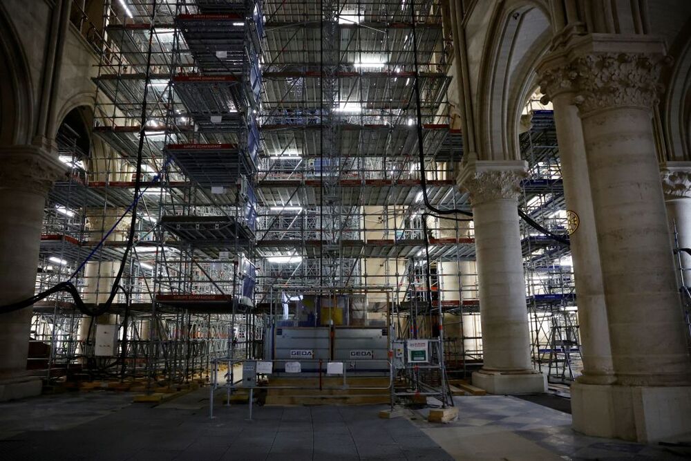 Nave of Notre-Dame Cathedral being restored four years after blaze  / SARAH MEYSSONNIER / POOL